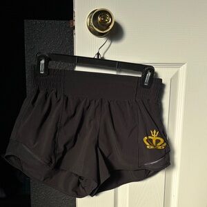 Women's Black Athletic Shorts with Gold Crest Accent